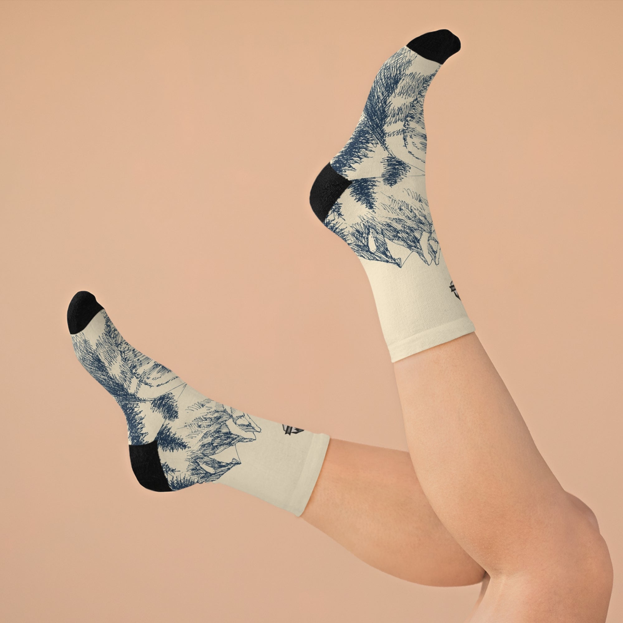 Discover comfort and sustainability with WildTrail Apparel's Recycled Poly Socks. Made from eco-friendly materials, our stylish socks provide a perfect fit for any adventure while helping you tread lightly on the planet. Shop now and embrace your wild side!